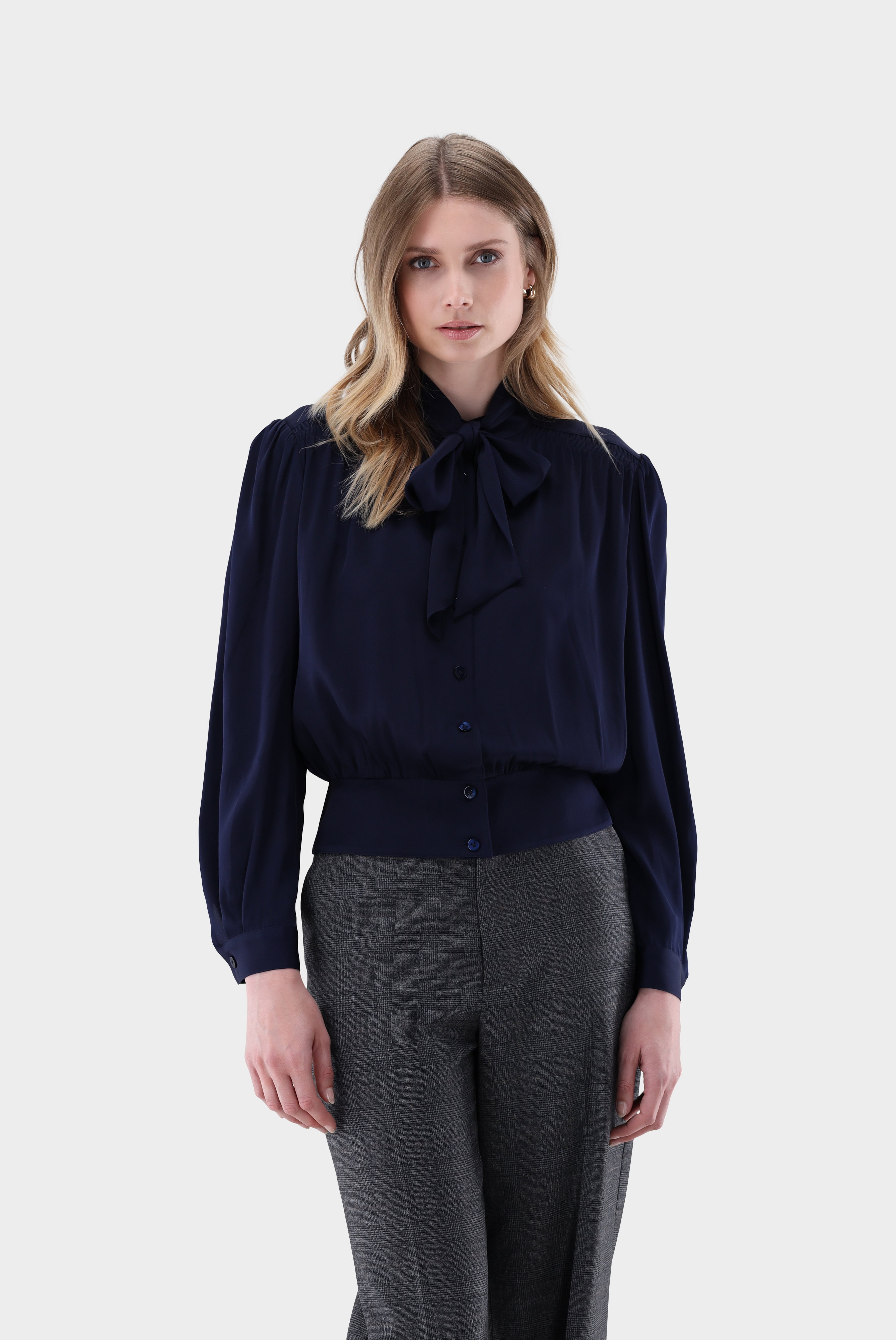 Pussy-bow blouse with gathered peplum