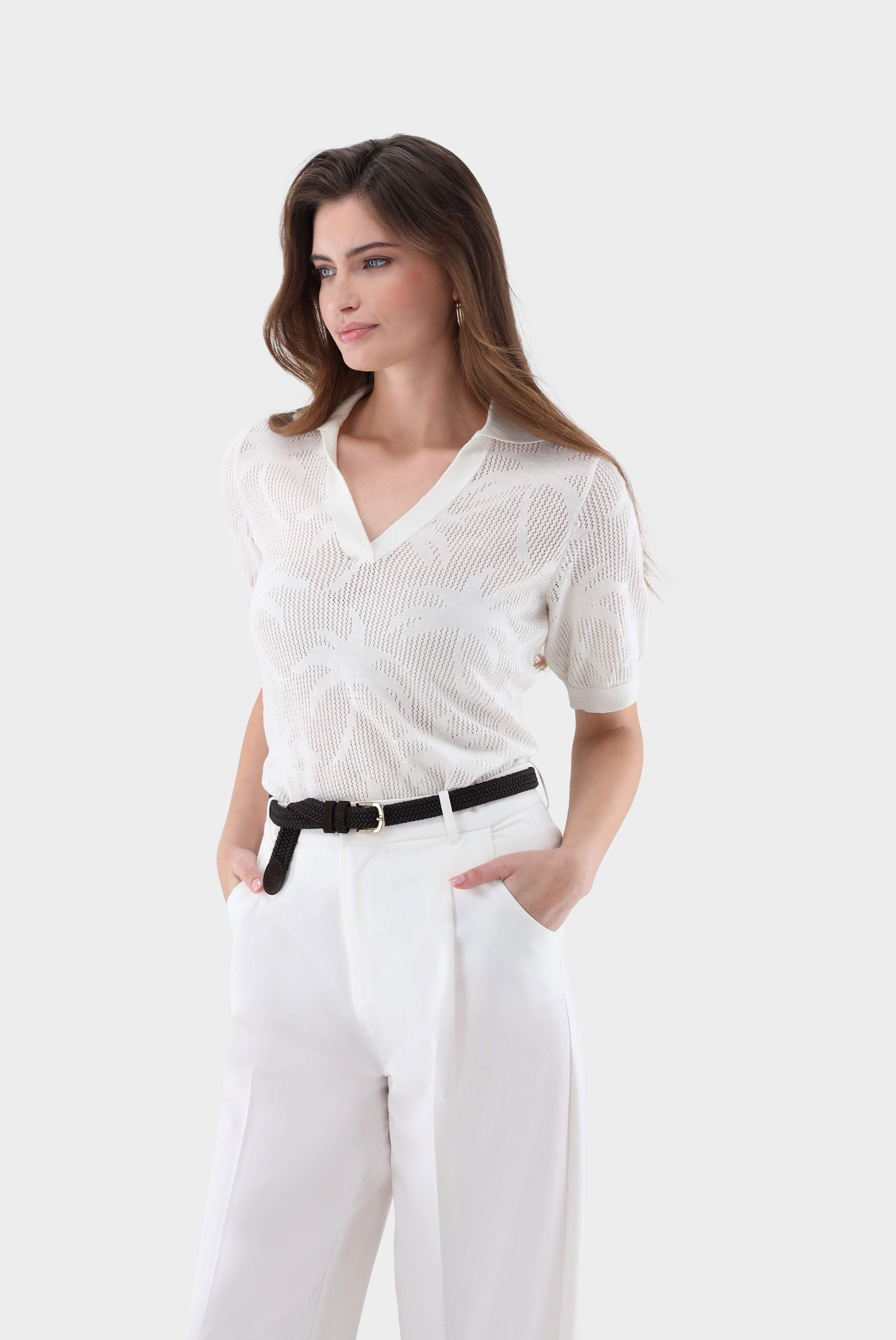 Polo shirt made of openwork knit with palm tree design