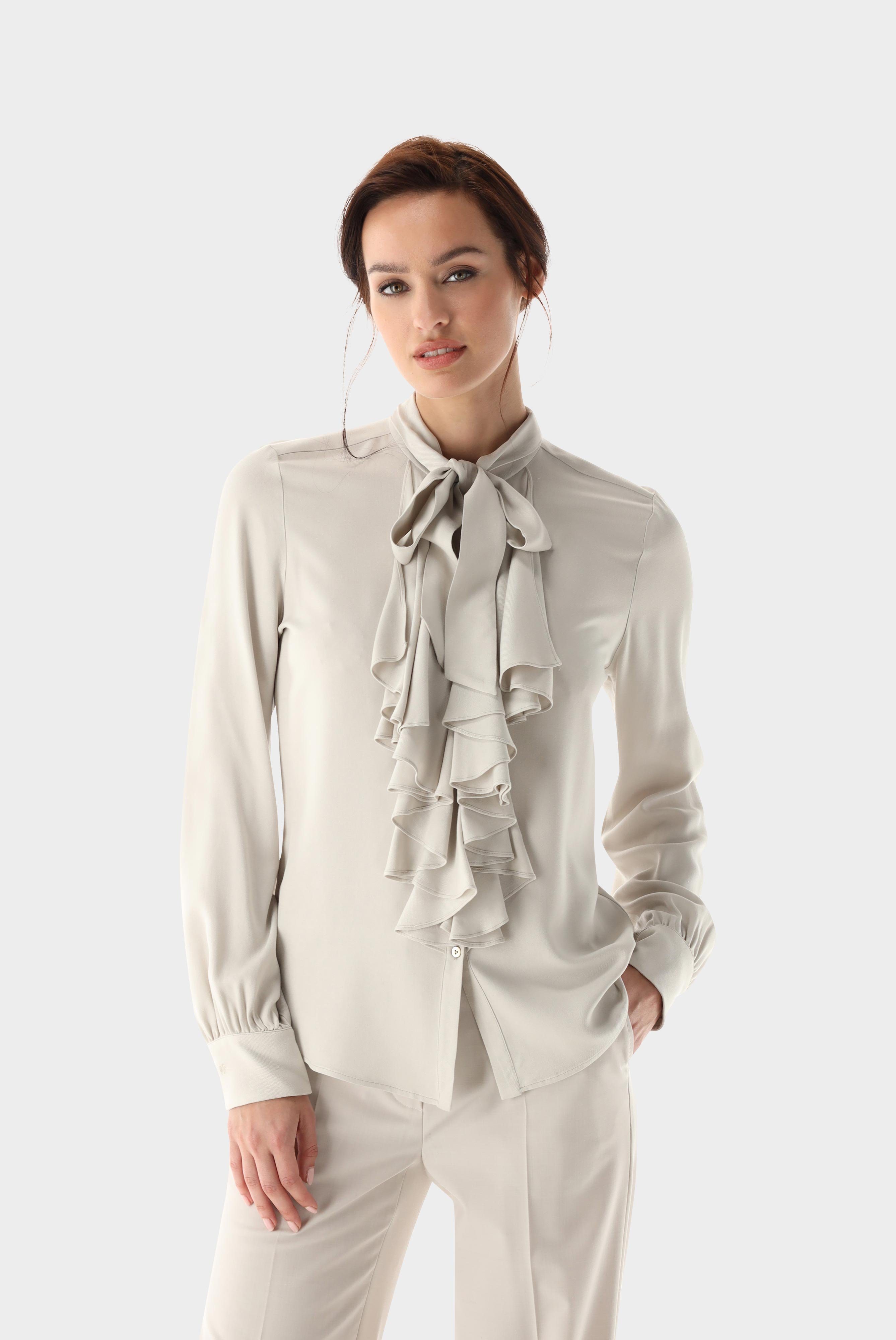 Standup-collar blouse with a flounce