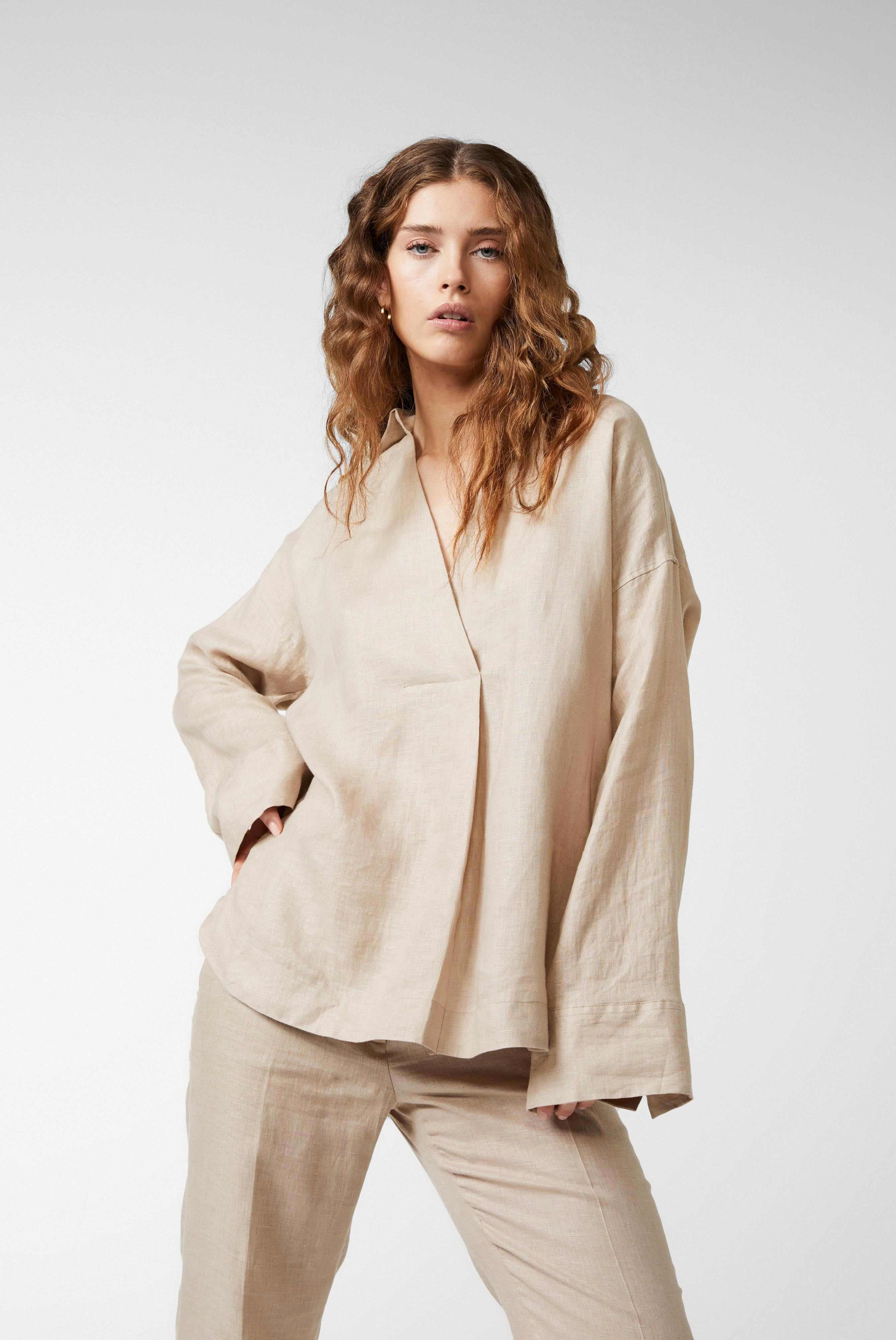 Oversize blouse with shirt collar and V-neck